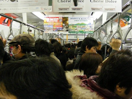 Actually this is only a moderately busy train by Tokyo standards